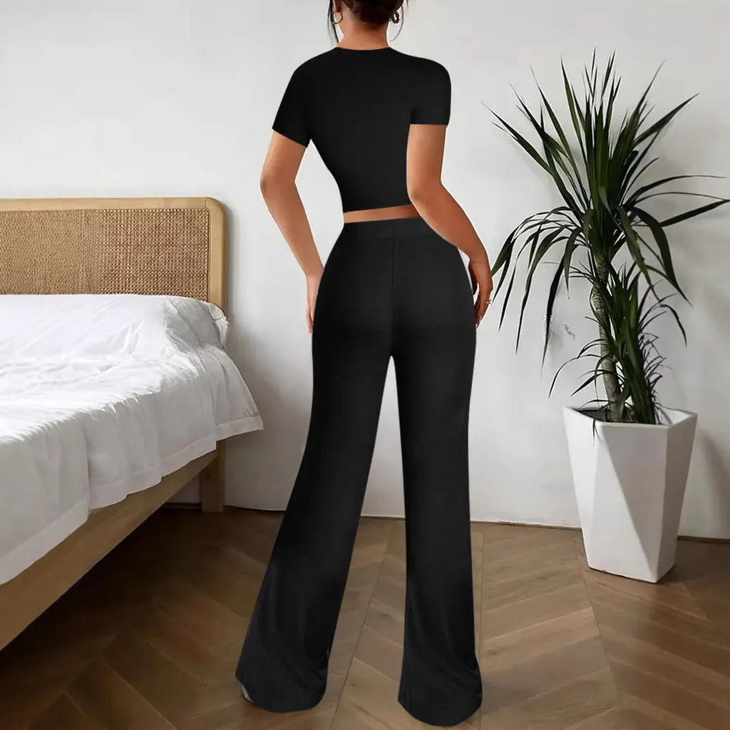 Black polyester women's suit set with high waist trousers and short sleeve t-shirt