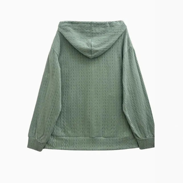 Green women's hooded zip-up coat with loose fit and long sleeves