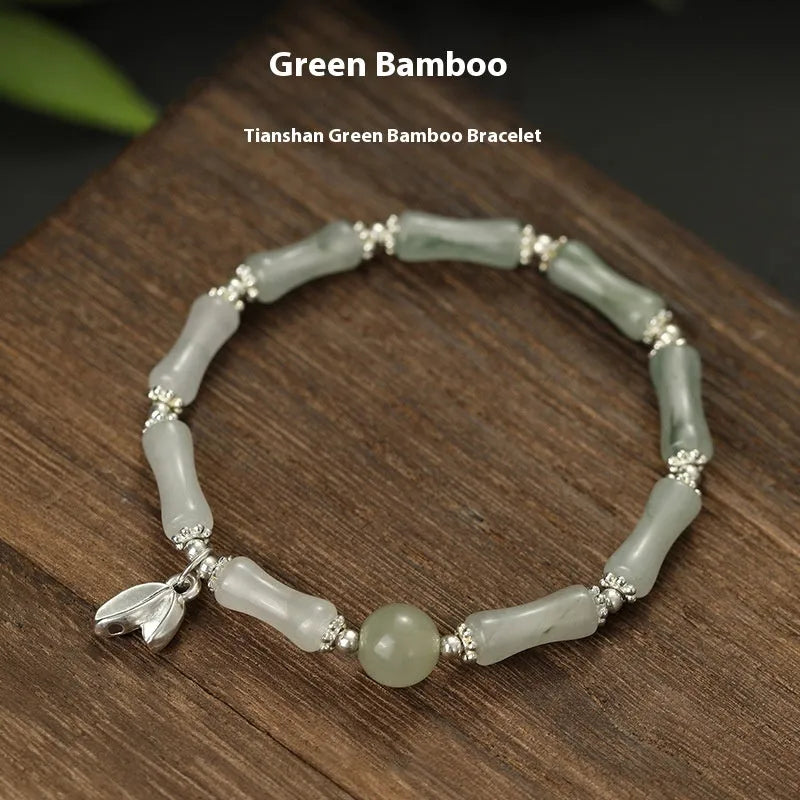 Natural Tianshan green bamboo and sterling silver antique-style bracelet for women with a bamboo joint motif.