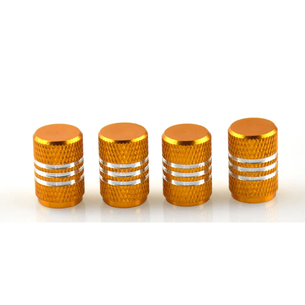 Set of stainless steel car tyre valve caps in assorted colours: black, red, blue, gold, silver, green, purple, sky blue, grey, orange.