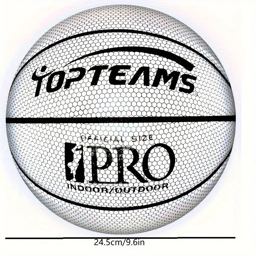 Holographic fluorescent reflective basketball glowing in low light