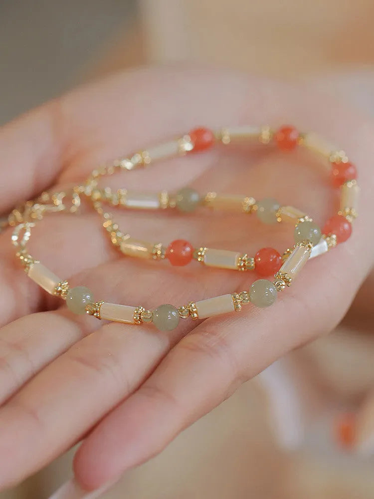 Hetian jade women's bracelet with bamboo joint design and 6mm beads.