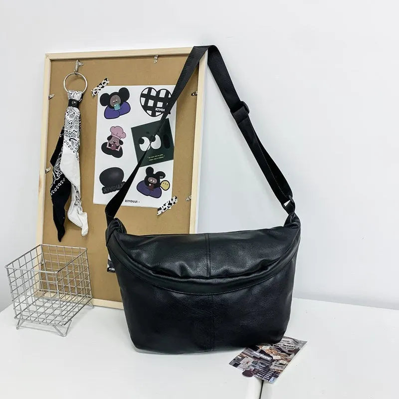 Men's brown retro crossbody bag showing 50cm width and PU leather construction