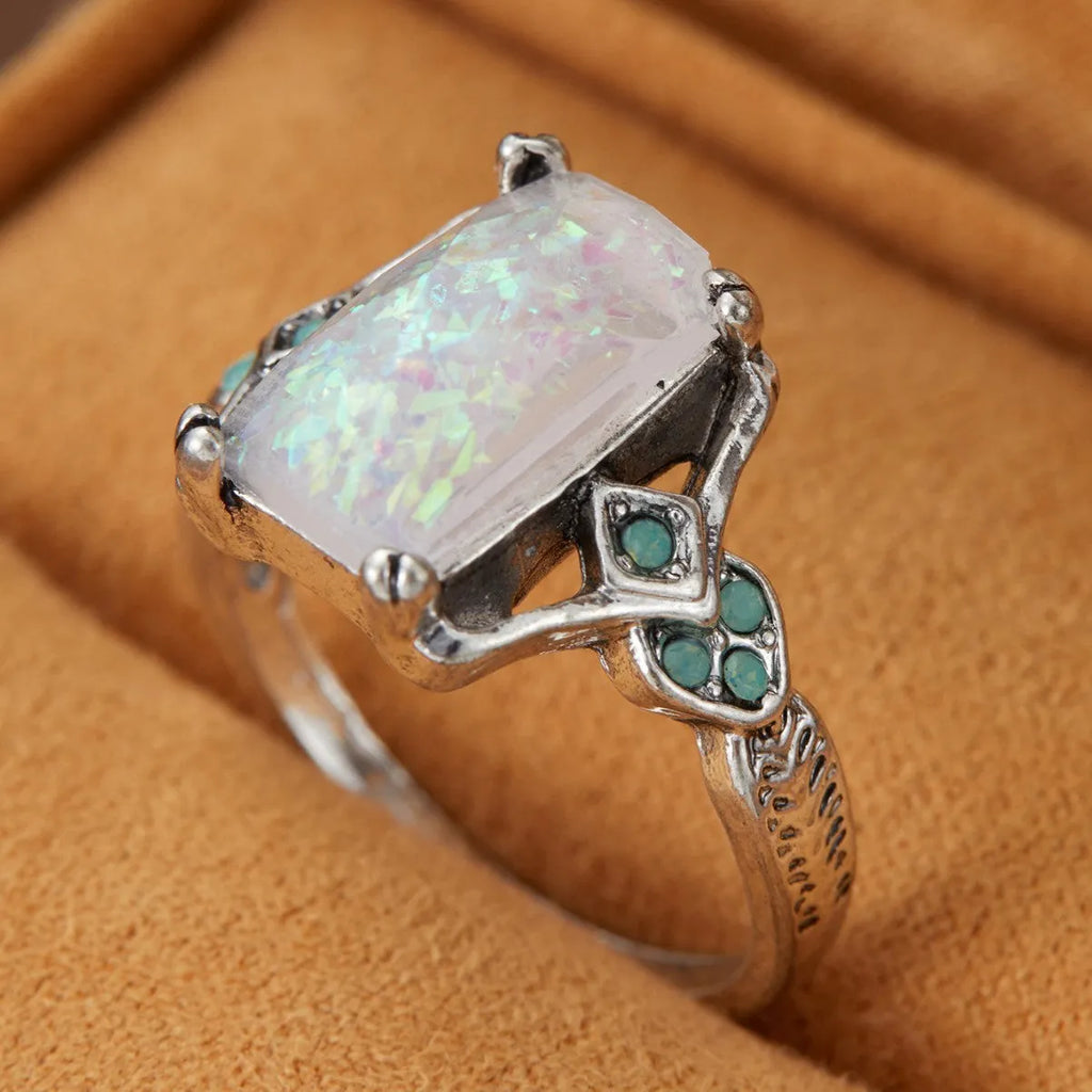 Rectangular white opal ancient silver ring on finger, silver tone, geometric design, alloy