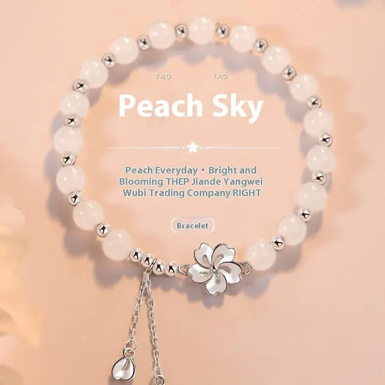 New Chinese style beaded bracelet with floral resin design in matching couple colour options