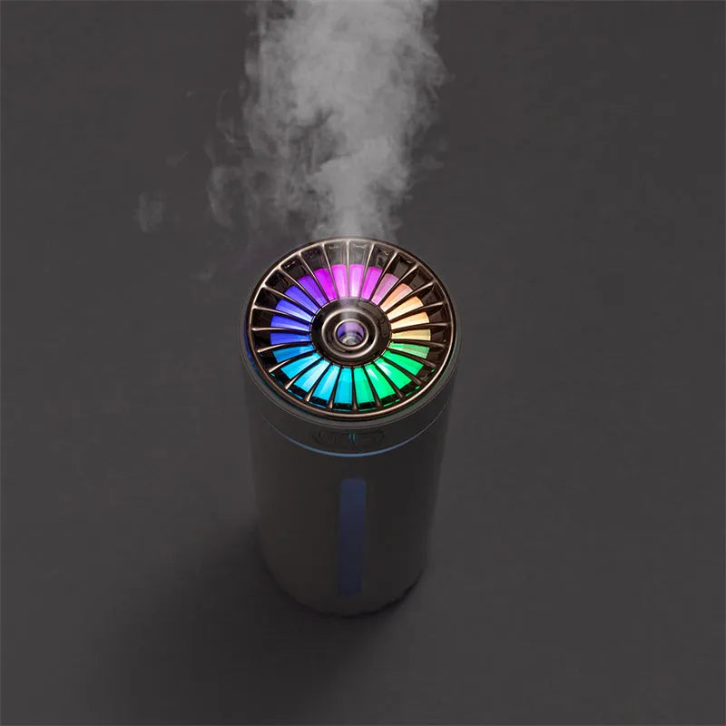 Portable black USB humidifier with colourful lights on car cup holder