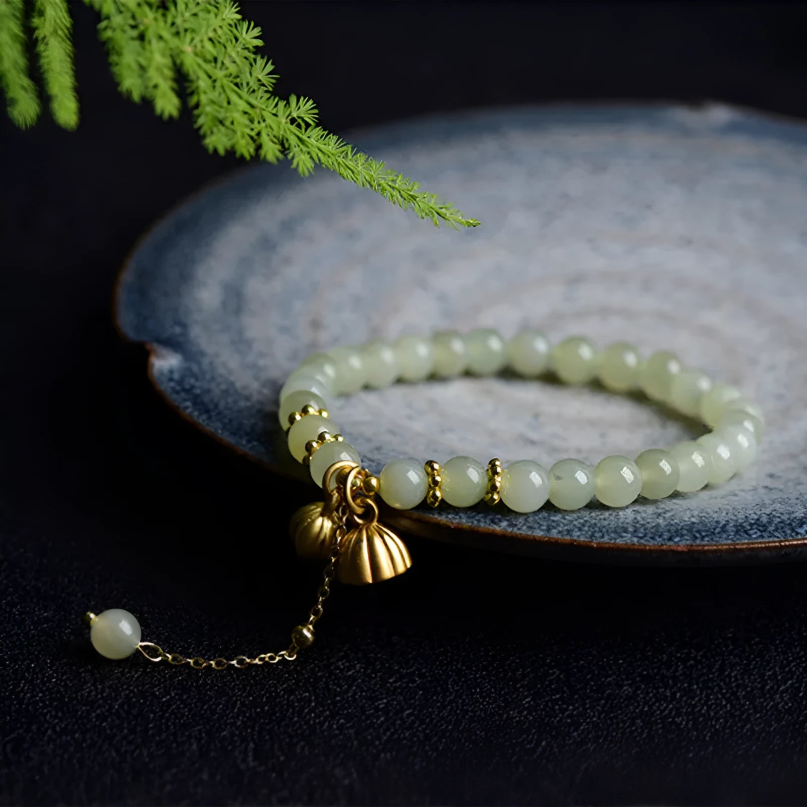 Natural Hetian Jade bracelet with six millimetre beads in step by step lotus pattern