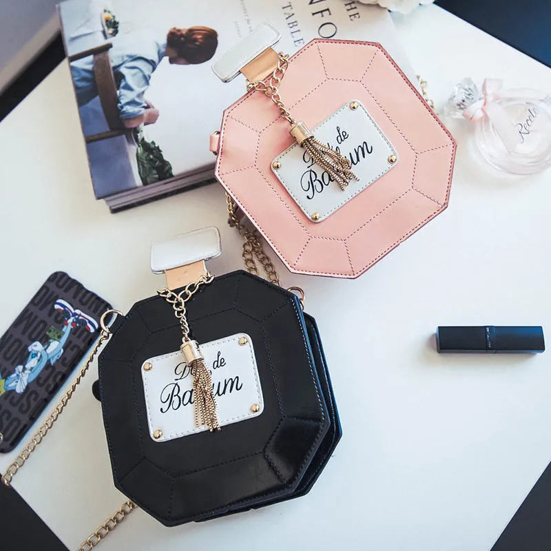 Mini chain crossbody bag for women, round PU leather shoulder bag with printed letter pattern and zipper closure