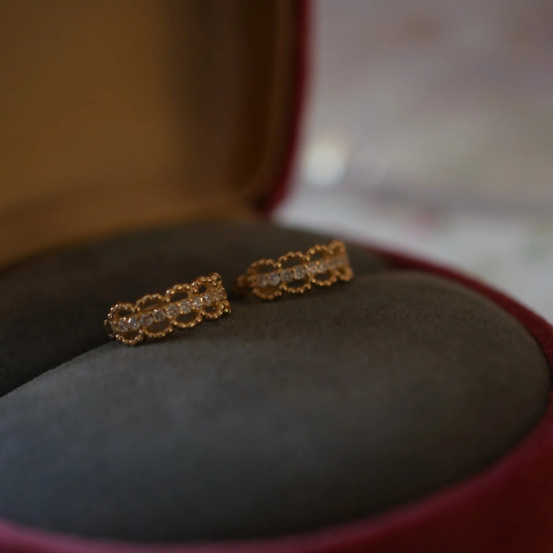 Small gold lace pattern ear clip earrings in 925 silver with electroplated finish