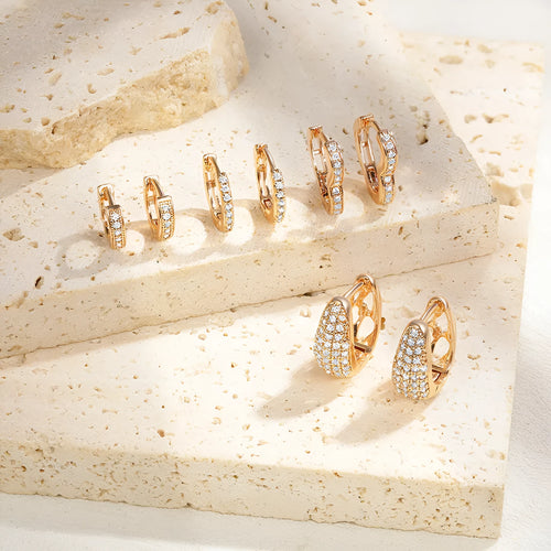 Brass gold plated heart-shaped ear clip earrings with gang drill decorative elements in electroplated colours