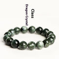 Green Dragon Crystal round bead bracelet with Ruyi design elements on a wrist.