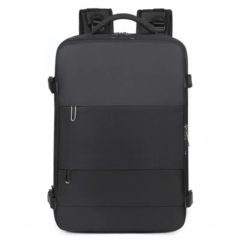 Large grey travel backpack for women with multiple compartments, shown open.