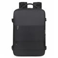 Large grey travel backpack for women with multiple compartments, shown open.