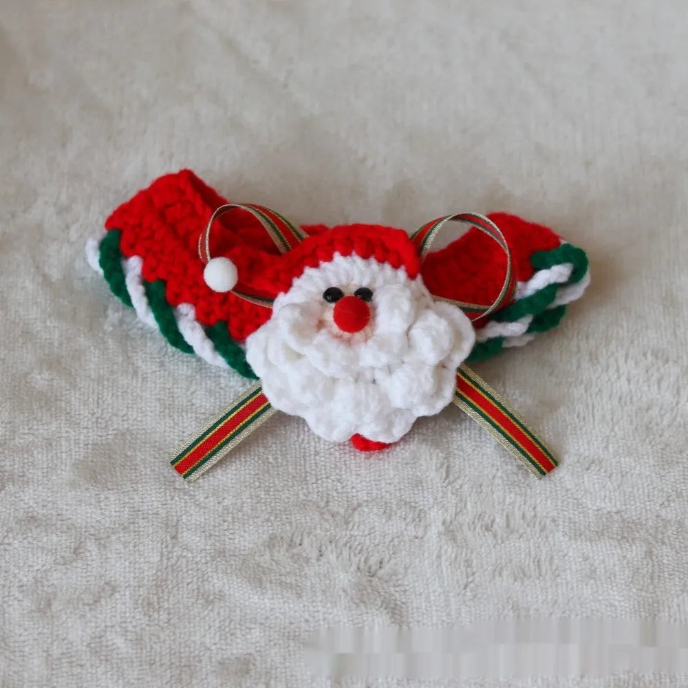 Knitted wool Christmas scarf for pets featuring festive patterns like striped Santa and elk, shown attached to a dog collar.