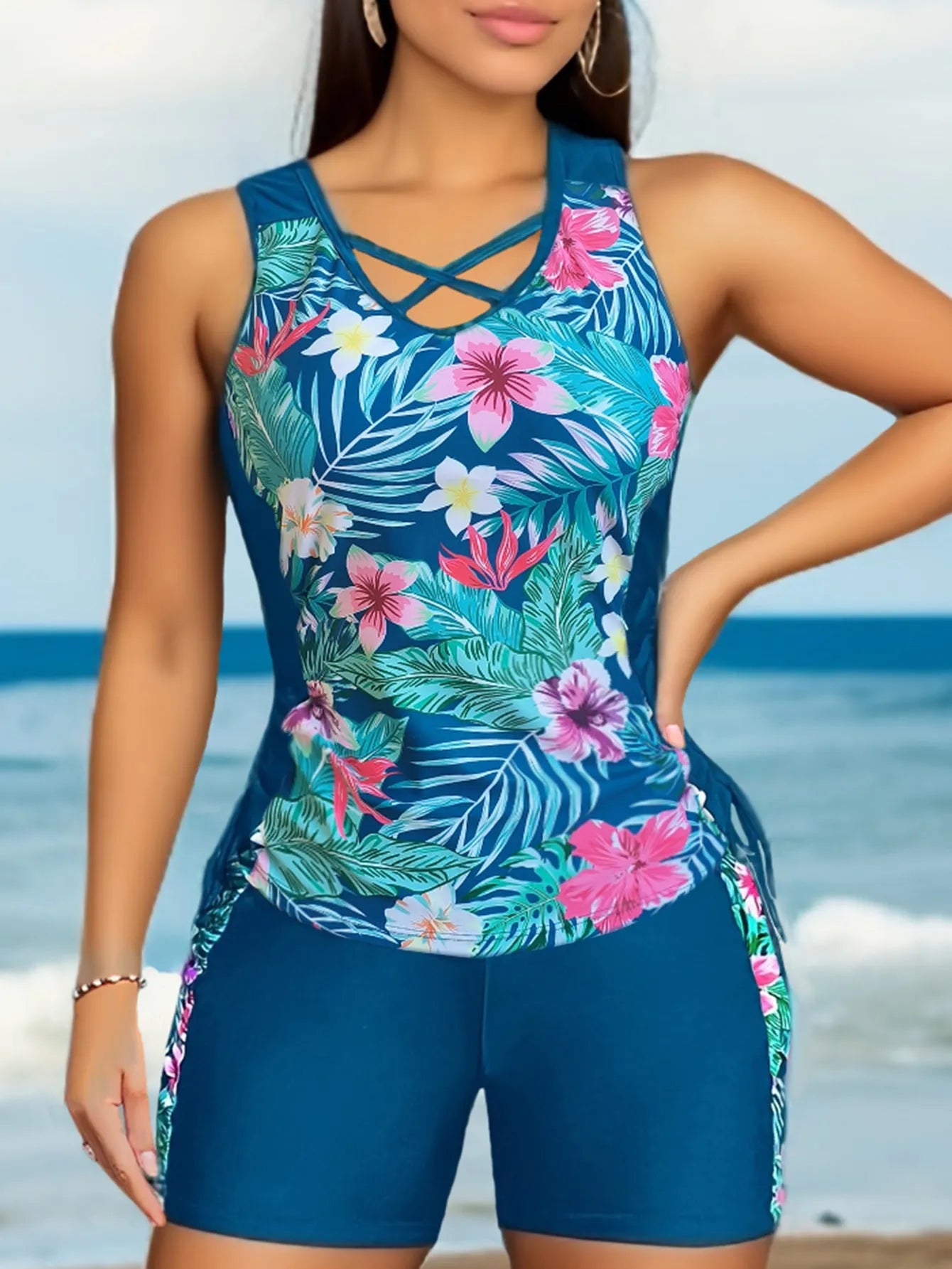 Plus size women's floral print bikini swimsuit with high waist briefs on a mannequin.