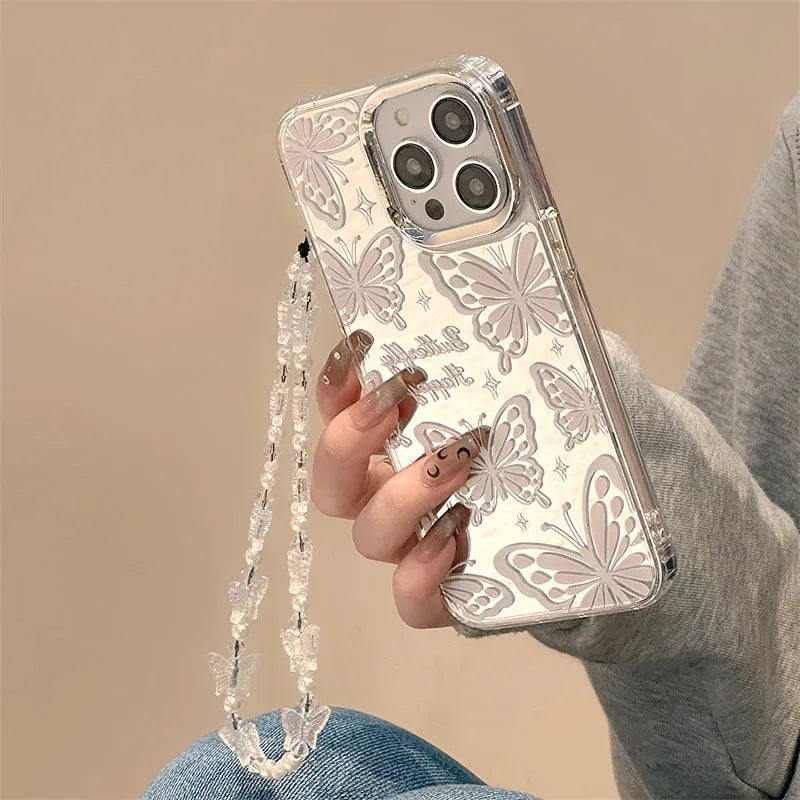 Clear iPhone 15 Pro Max case with 3-in-1 mirror and bow decoration on transparent TPU