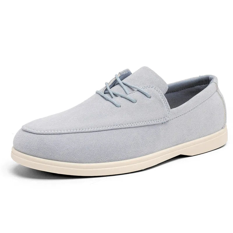 Men's slip-on suede loafers in beige with elastic band and rubber sole, side view