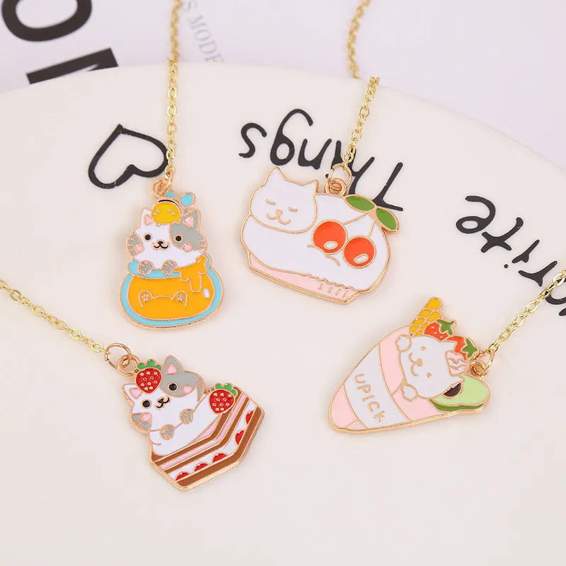 Jane Key Foodie metal bookmark with cartoon cat design, showing four style options including Strawberry Cake Cat.