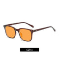 Colour-changing orange lens anti-blue light glasses with a TR90 frame on a colour box.