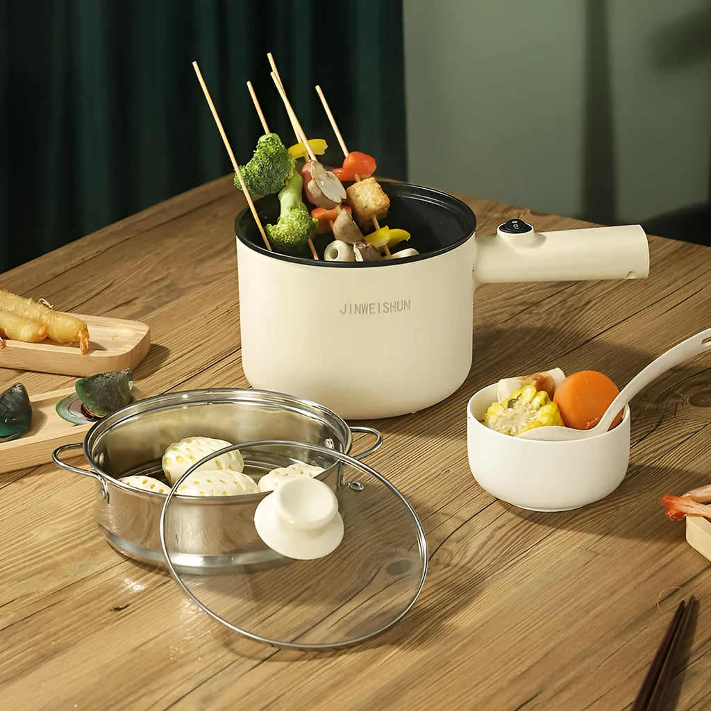 White, green, and khaki mini electric hot pot with non-stick interior and control panel.