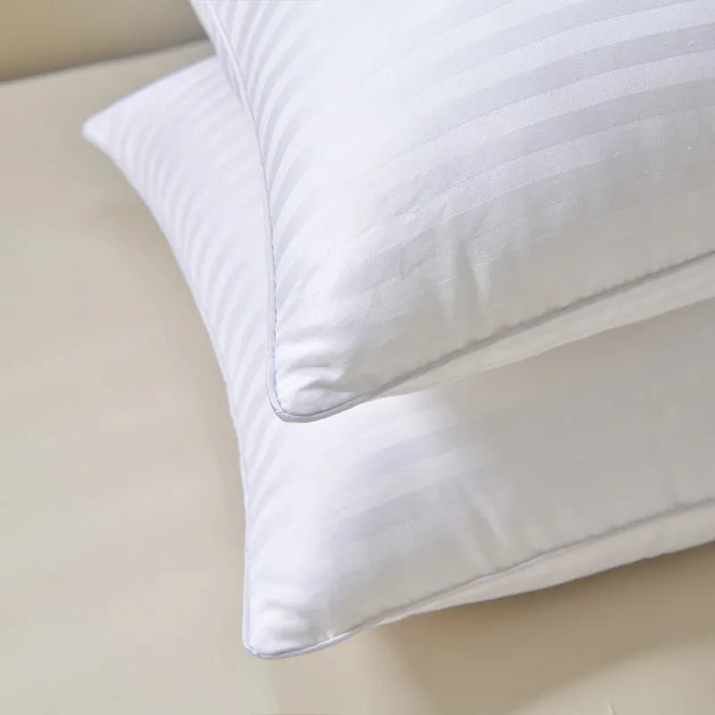 White hotel cotton satin stripe feather and cotton pillow showing size options.