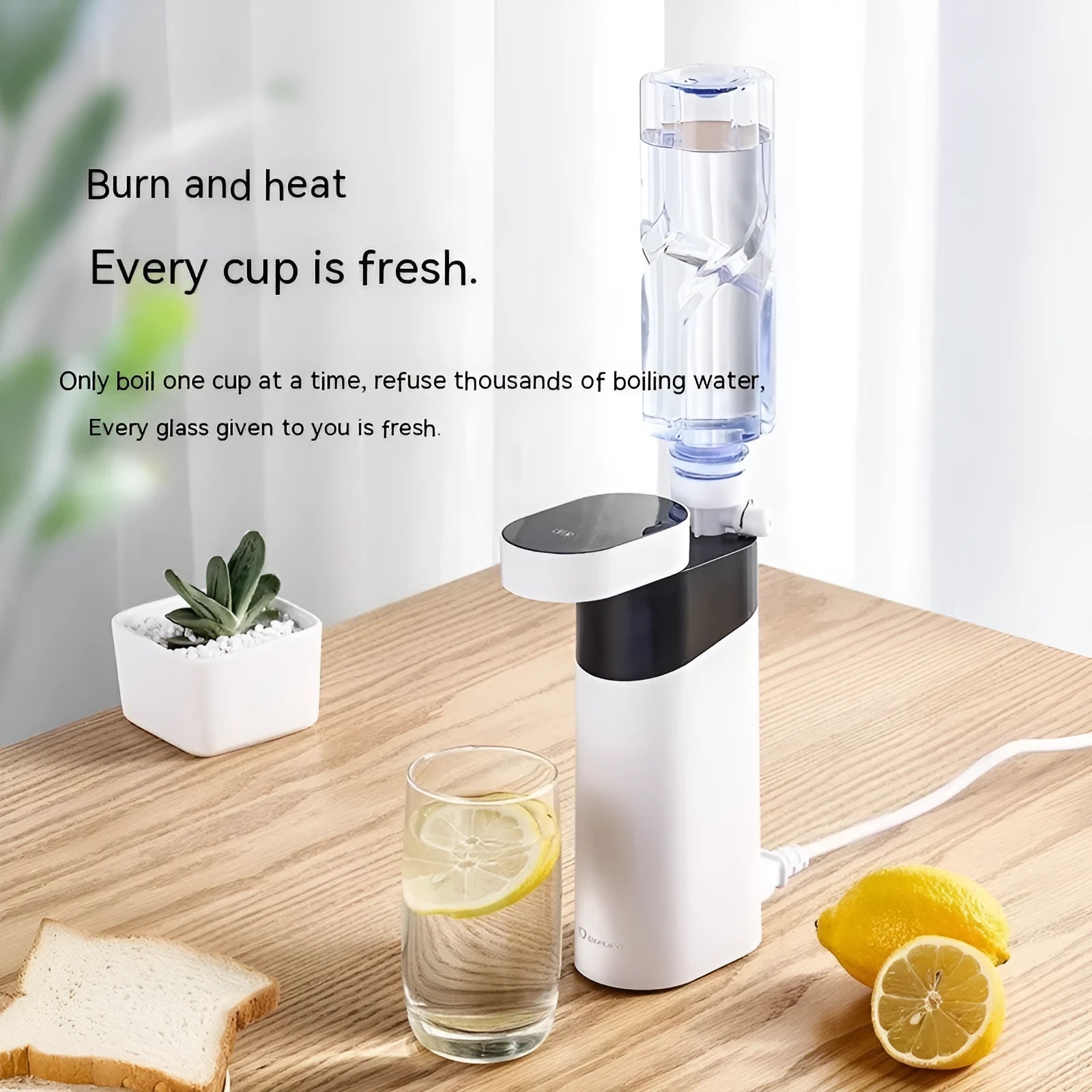 Black portable instant water dispenser with digital display on a wooden desktop.