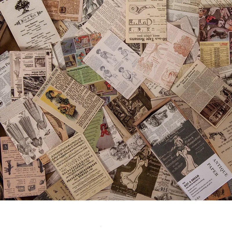 Pack of 100 small double-sided retro paper notes in various vintage colours on a wooden surface.