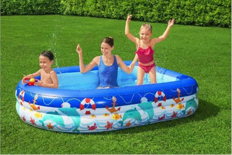 Boat type inflatable PVC sunshade paddling pool for children, 2.13m long, blue with yellow canopy, set up in garden