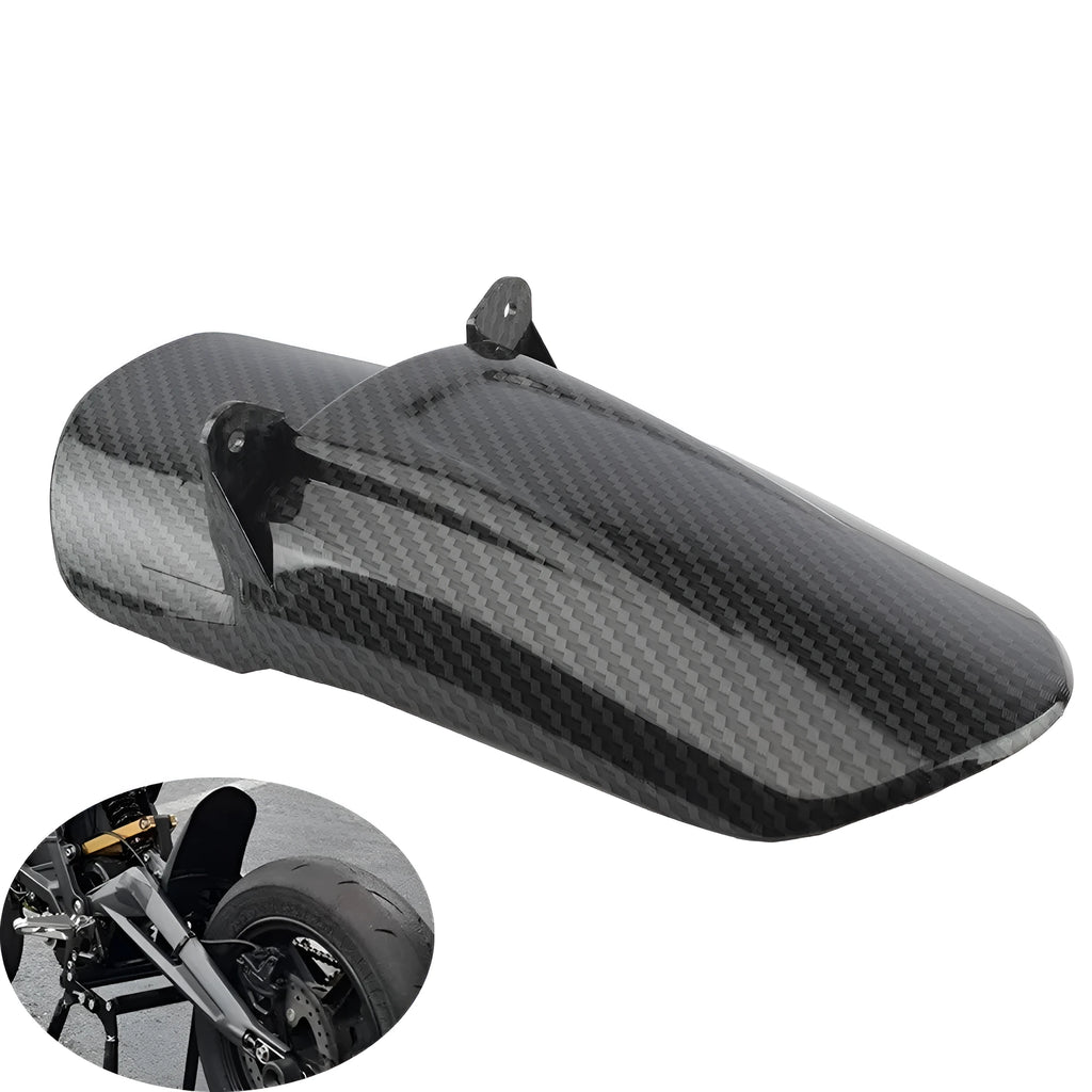 Carbon fibre rear shock absorber fender for a scrambling motorcycle.