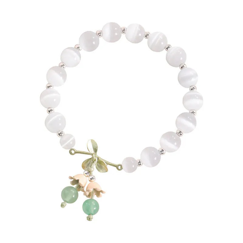 Women's cat's eye stone beaded bracelet with diamond-shaped opal beads and electroplated metal clasp in one of sixteen colour options