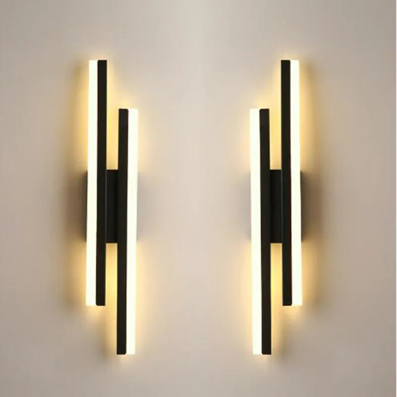 Modern minimalist Scandinavian LED wall light with acrylic shade in black or gold finish, shown in 48cm, 50cm, and 65cm sizes.