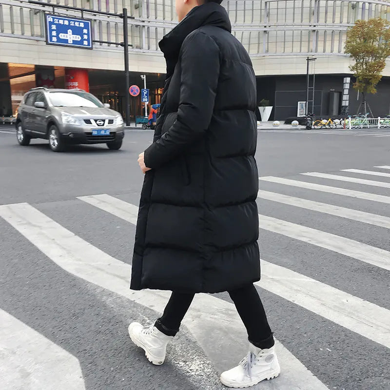 Long cotton-padded jacket in black with stand-up collar, over-knee length, casual winter coat for women